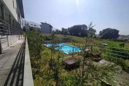 Apartamento Con Piscina * リャネス